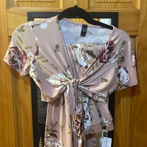 Very pretty two pice floral set. Very soft brand new with tags.